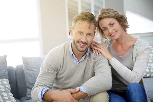 Couple sitting together.