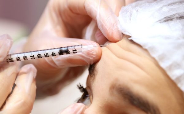 botox being injected in the forehead