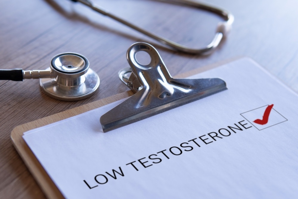 Stethoscope and clipboard with text 'Low Testosterone'